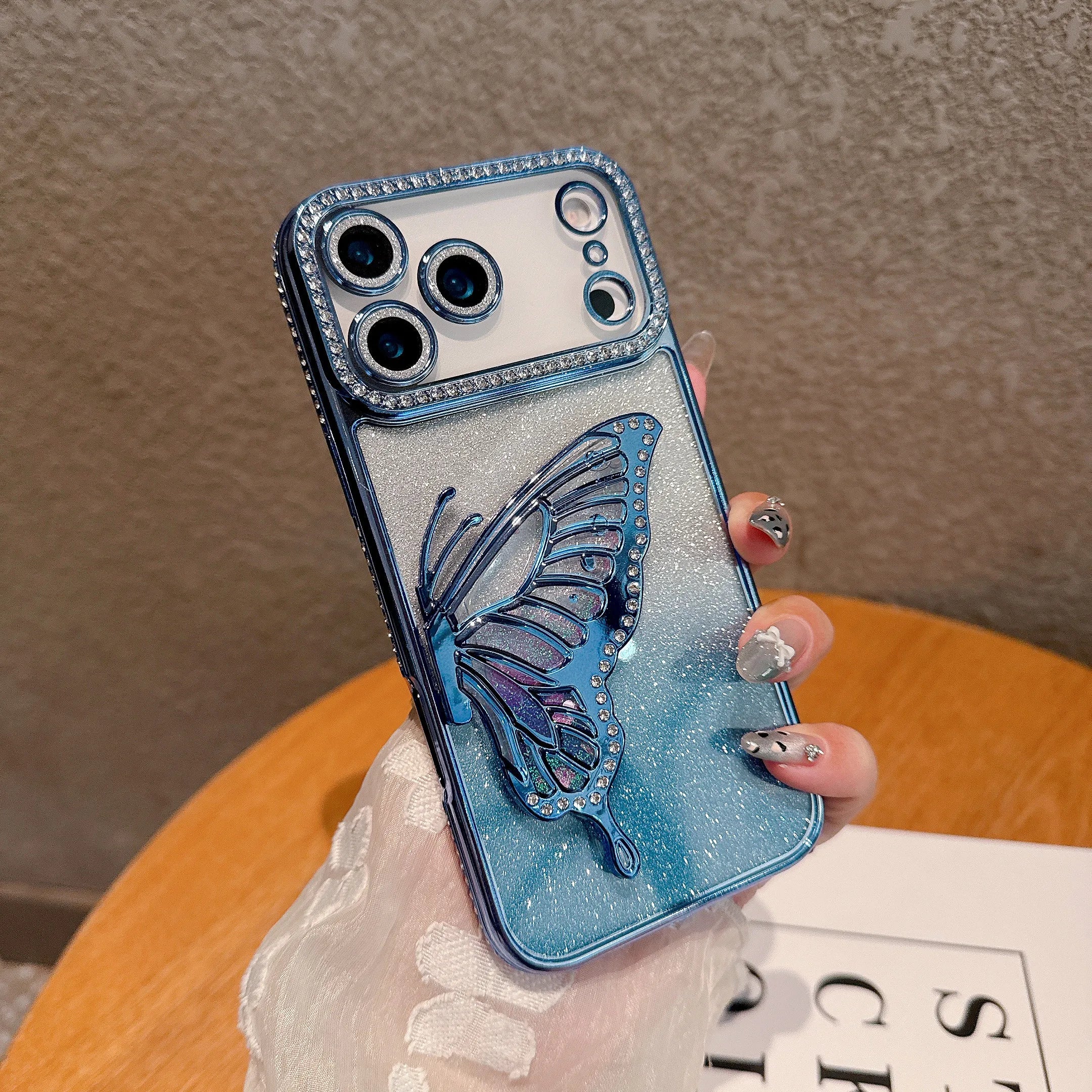 Glitzernde Schmetterling-Hülle für iPhone 17