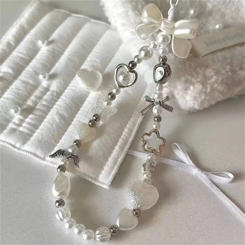 Perlen-Handykette mit Blumen & weißer Schleife