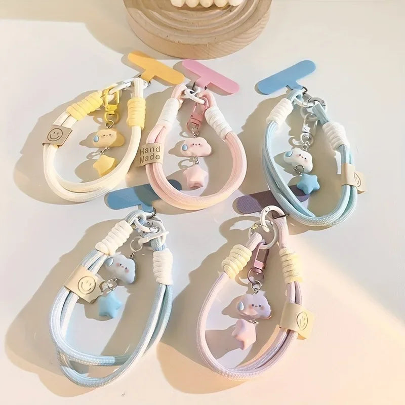 Bunte Handy Handschlaufe mit Stern- und Wolken-Design