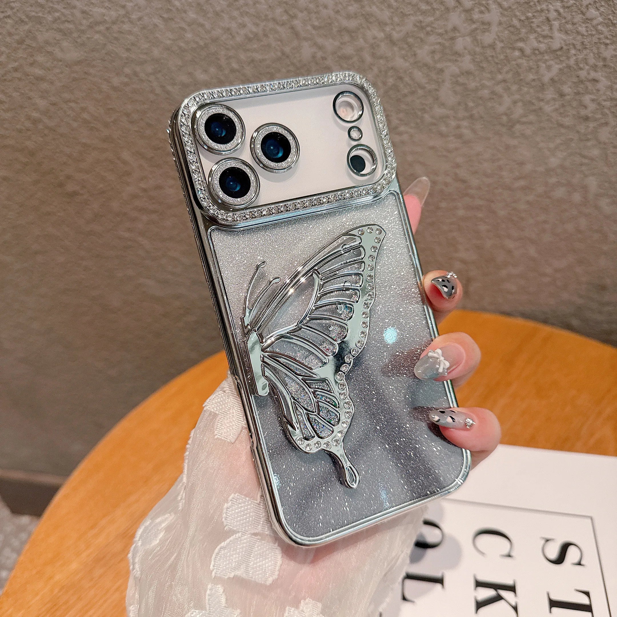 Glitzernde Schmetterling-Hülle für iPhone 17